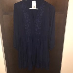 Navy blue peasant dress with floral detail